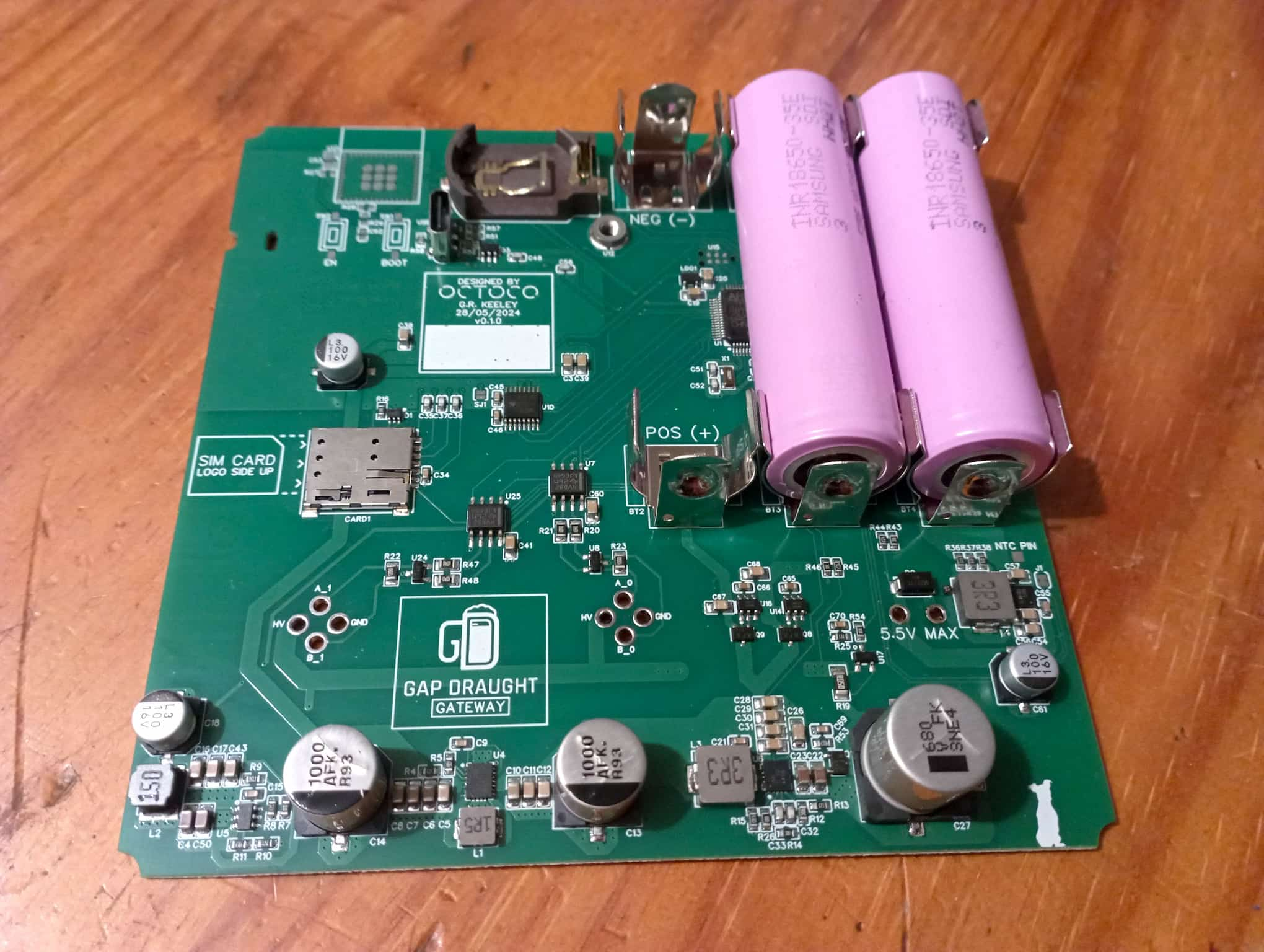 An actual gateway PCB with two 18650 cells inserted.