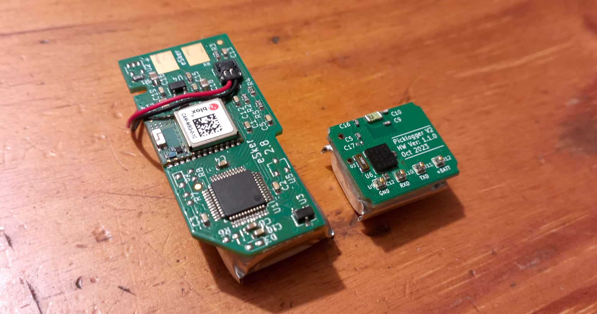 The V1 PCB and battery next to the V2 PCB and battery.